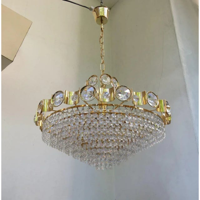 A large ceiling lamp, chandelier, from the 70 years of Palwa. The light is very elaborately and high quality. there were...