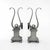 Bold, structurally sound scroll-top pair of andirons. Substantial patinated plinth base resting upon balled-feet with a...