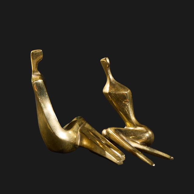 Itzik Benshalom Israeli Gilt Bronze Seated Couple Sculpture This sculpture measures: 5.25 wide x 5.75 deep x 4.5 inches...