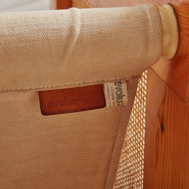 Single Italian Mid-Century Modern lounge chair from the 1970s. Crafted by Evoluzione in Italy, these chairs feature a...