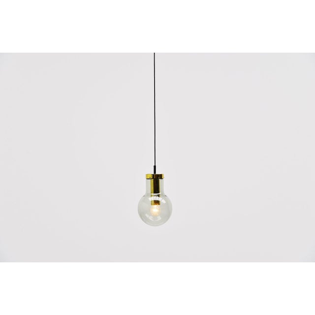 Very nice pendant lamps model Maxi Globe designed and made by Raak Amsterdam, The Netherlands 1965. These pendants have a...