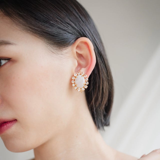 Introducing our Luna Studs, crafted from semi-precious stones in a cluster design. These studs feature hooks to add a...