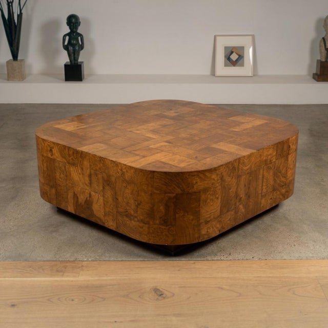 This is a fabulous patchwork burl modern floating coffee table attributed to the famous furniture designer, Paul Evans....