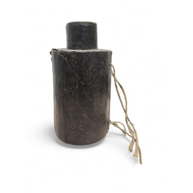 This is an instrument that consists of a brass base and a brass stand on which a semi-circular metal dial plate and gnomon...