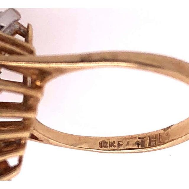 14 Karat Yellow Gold Free Form Ruby With diamond Accents Ring Size 7 2.46 grams total weight.