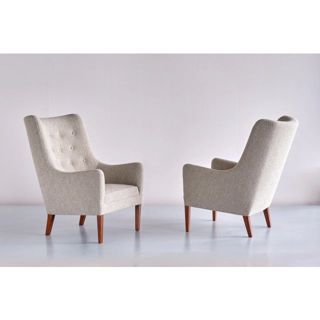 This very rare pair of armchairs was designed and produced by Jacob Kjær in Denmark in the late 1940s. The sumptuous...