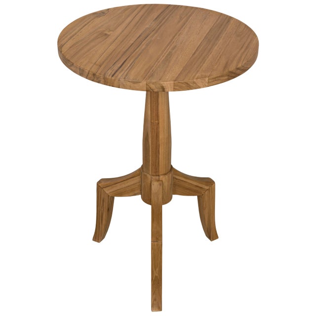 The perfect blend of strength and style, this striking accent table has been hand-carved of minimally finished teak, one...