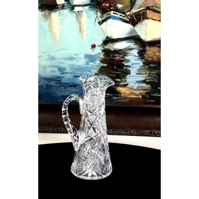 Very large American brilliant period- (1880-1920)-cut crystal pitcher/jug-champagne pitcher I have put it under a black...