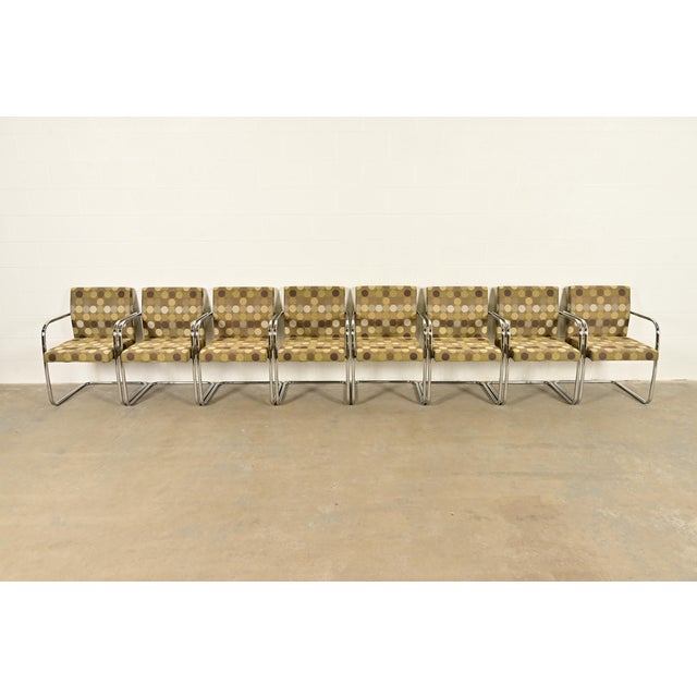 An exceptional set of eight Mid-Century Modern "Brno" style tubular cantilever lounge chairs or club chairs In the manner...