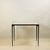 Chic large 'Esquisse' wrought iron and Macaubas side table by Design Frères. Contrasting white marbled Macaubas stone top...