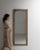 This mirror makes its impression through natural honey oak frame, arched top. Dating to 1910s and originating from France,...