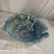 This appears to be a vintage hand-blown Murano-style art glass decorative bowl featuring a fluted rim and blue, green, and...