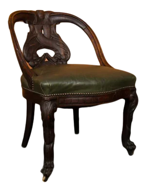 19th Century Chinese Carved Dragon Chair With Leather Seat.
