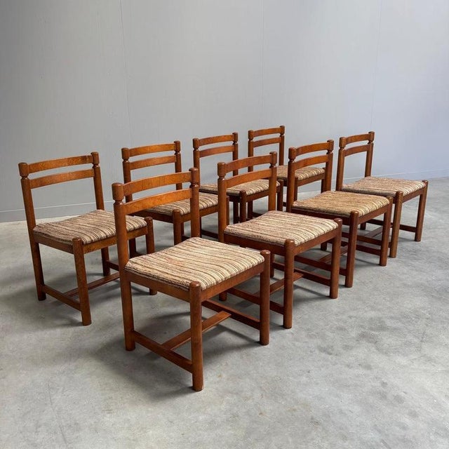 Remarks: Set of eight Asko dining chairs, Finland 1960s Oak wood frames with wool upholstered seats. All in very good...