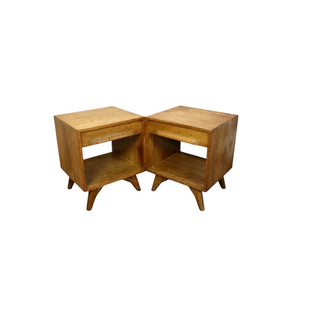 This set of oak nightstands were designed by Jack Van Der Molan for Vanleigh. The oak was sourced from Jamestown Lounge...