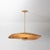 A dialogue between form and material, this nature-inspired design undulates with charm. The interplay of woven rattan and...