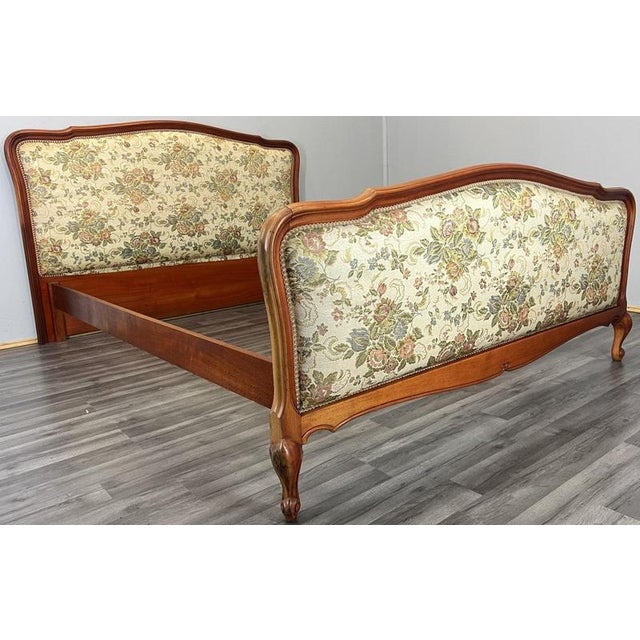 This elegant Vintage French double bed frame features beautifully shaped headboard and footboard panels, richly...