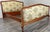This elegant Vintage French double bed frame features beautifully shaped headboard and footboard panels, richly...