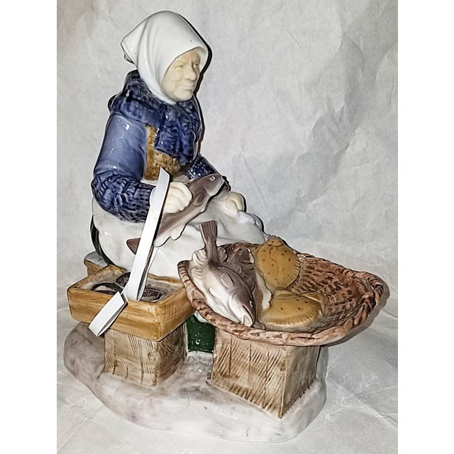 Royal Copenhagen by Bing & Grondahl, 'the Fish Market Woman' by sculptor Axel Locher. A Royal Copenhagen Danish porcelain...