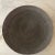 Large statement grey shallow bowl. Small embellishments of melted brass work in beautiful accord with smoky- colored iron...