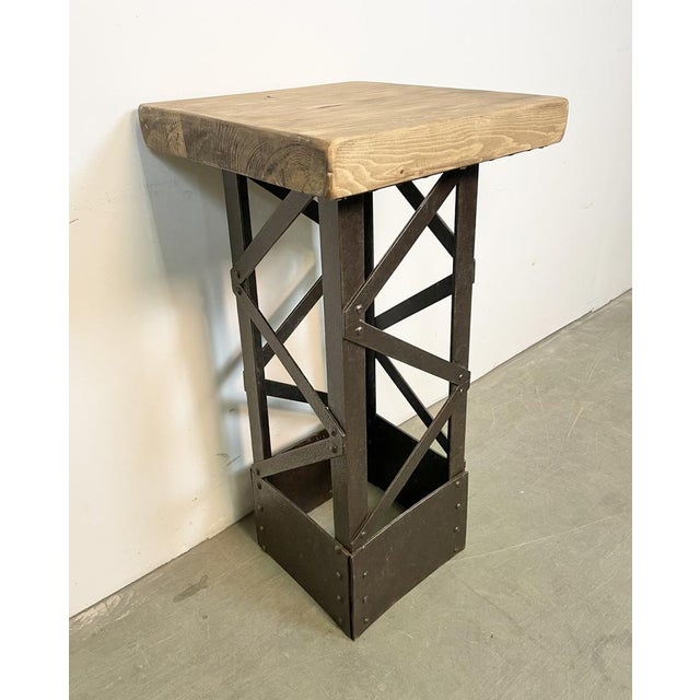 - Vintage Industrial side table manufactured in the 1960s - Made of solid wood and riveted iron - Weight of the table is...