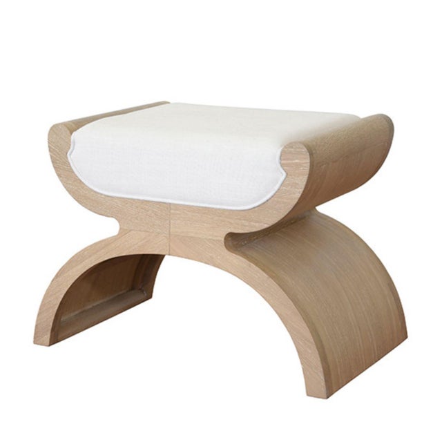 With sweeping curves and sculptural shape, the Asian-inspired Janna stool is a true conversation piece. With natural oak...