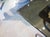 A French 1970s Wrought Iron and Brass Dining Table With Smoked Glass Top For Sale - Image 9 of 18
