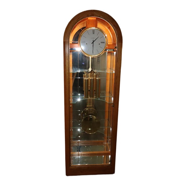 Howard Miller “Eternity Ii” Curio Grandfather Clock, Model 610-683, Oak Case With Illuminated Mirrored Interior For Sale
