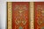 Chinese Four-Panel Red Lacquer Folding Screen with Hand-Painted Floral Scrollwork For Sale - Image 3 of 12