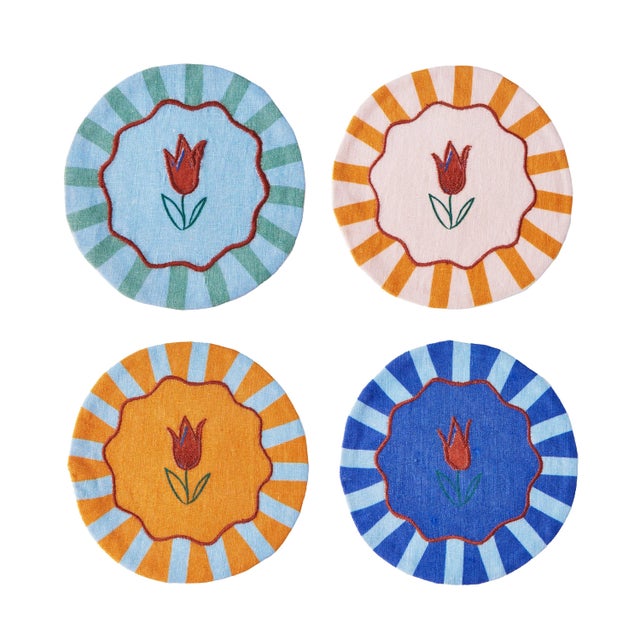 One look at these embroidered coasters featuring a tulip motif and candied-colored stripes may have you thinking they're...