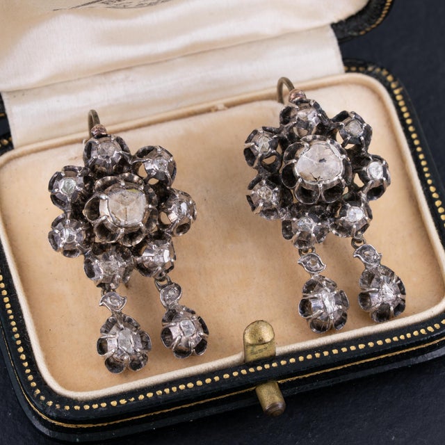 Pair of antique Georgian period diamond earrings featuring rose cut natural diamonds set in silver. Late-Georgian Circa...