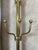 A superb brass entryway coat rack dating from the early 20th century, typical of the elegance of Belle Époque interiors....