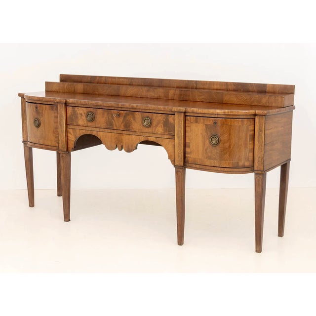 George III Figured Mahogany Bowfront Sideboard With Cellarette Drawers | England, Circa 1800 For Sale - Image 4 of 10