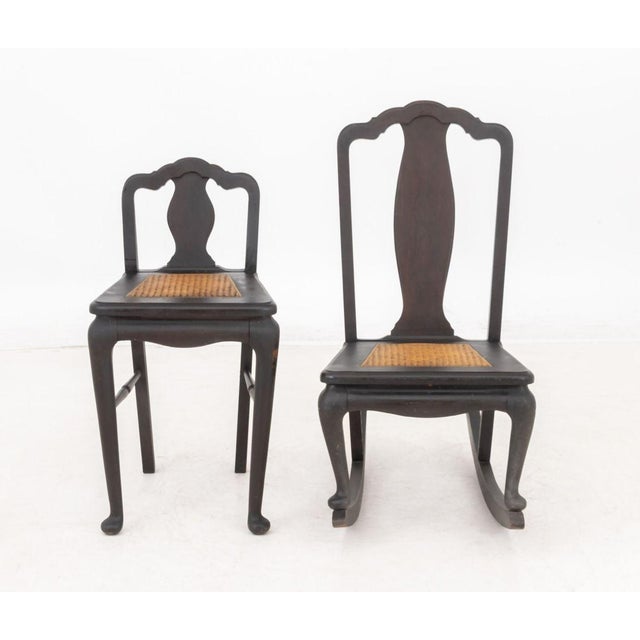 Two Queen Anne Style Cane Paneled Seat Chairs, a rocking chair and a child's chair. Larger: 33" H x 17" W x 39.5" D; seat:...