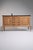 Rendered in richly grained French oak, this distinguished sideboard evokes the graceful sensibility of the Louis XV period...