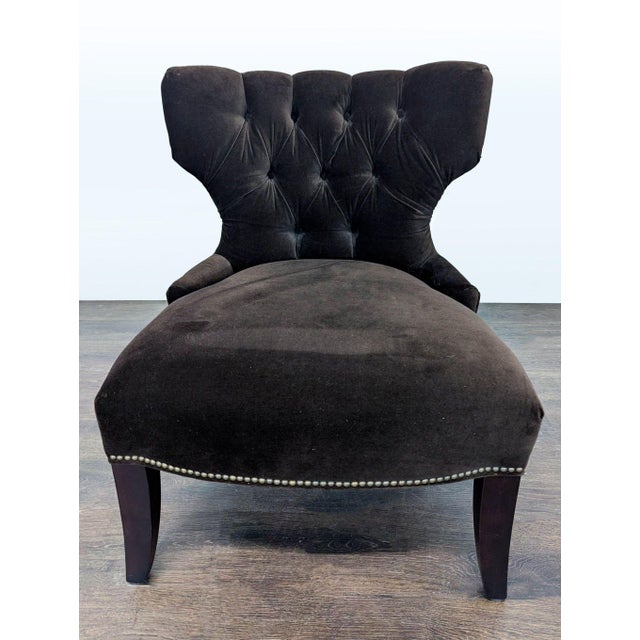 Relax in style with this Pottery Barn tufted lounge chair. It features a soft brown velvet fabric, elegant button-tufted...