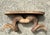 This striking wall bracket captures the rugged elegance of traditional hunting lodge decor with its masterful faux ram’s...