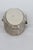 This lovely Lidded Pill Box is made of metal and features a cream-colored oval decorating the top of the lid. This...