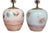 A pair of hand painted Postmodern table lamps by ceramic artist Judith Stiles of New York, NY. Vases are topped with brass...