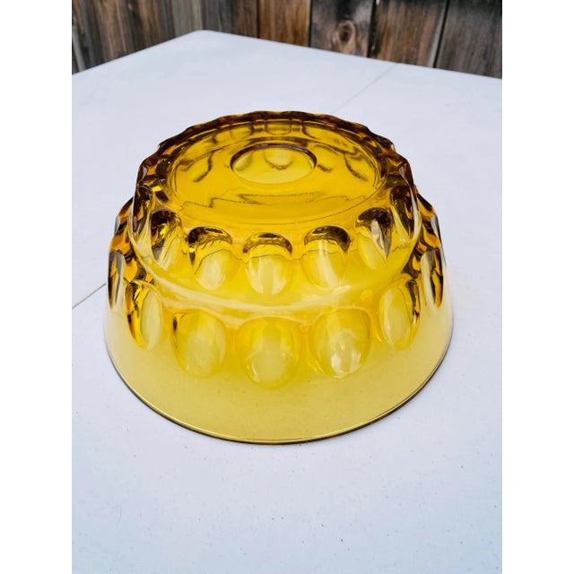 Wonderful mid century modern amber glass serving bowl. Circular cut design pattern with wide mouth. Perfect for serving...
