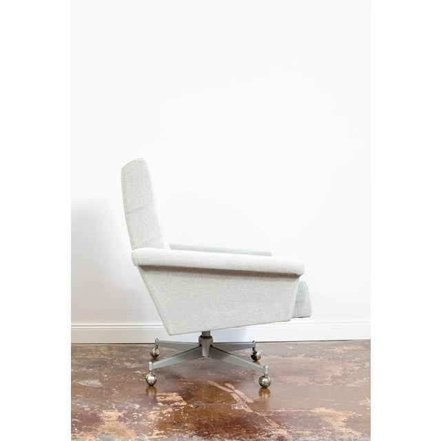 Office chair from UP Závody on metal wheels, Czechoslovakia, 1970 Fully reupholstered chair in white-grey-white easy-to-...