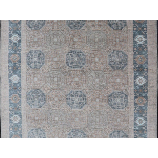 Modern Modern Hand Knotted Khotan in Wool With All-Over Medallion Design in Blue and Earthy Tones For Sale - Image 3 of 13