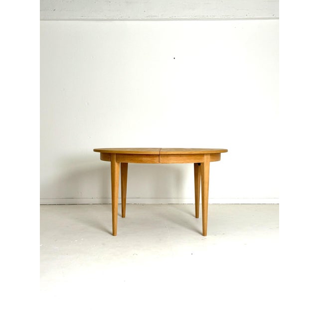 Gunni Omann Extendable Dining Table, Model 55 – Soaped Oak, Denmark, 1960s Rare extendable round dining table designed by...