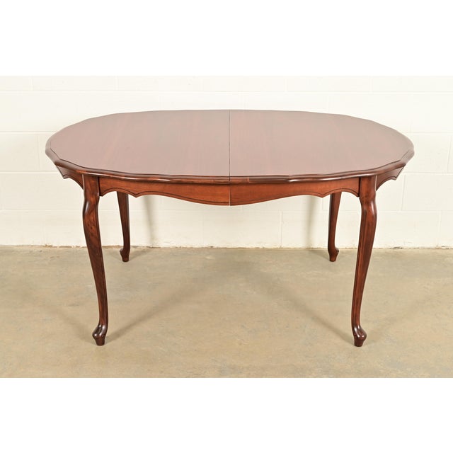 A gorgeous French Provincial Louis XV or French Country style extension dining table Attributed to Kindel Furniture USA,...