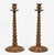 A very tall pair of Victorian bobbin turned walnut candlesticks with turned candle cups and turned round bases.