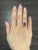 This beautiful natural rubellite ring weighs 7.75 ct. It has a striking 6.90 ct rubellite teardrop gem and 38 diamonds...
