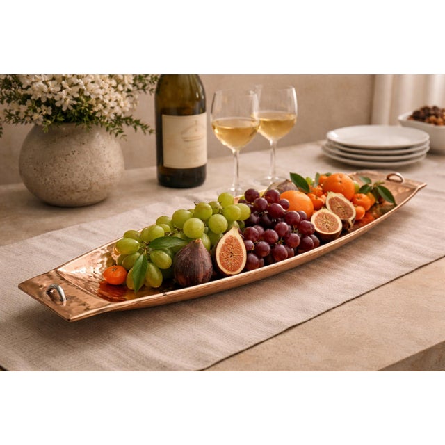 A striking and sculptural large-scale serving tray or centerpiece bowl designed by renowned Mexican silversmith Emilia...