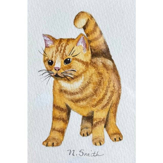 This original miniature watercolor captures the confident charm of a ginger tabby mid-stride, tail lifted with quiet...