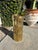 Vintage brass umbrella stand with flared top and tapered cylindrical body. Features two side ring handles and vertically...