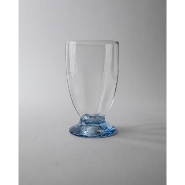This vintage set of 6 drinking glasses from the 1980s combines timeless elegance with a playful touch of color. Crafted...